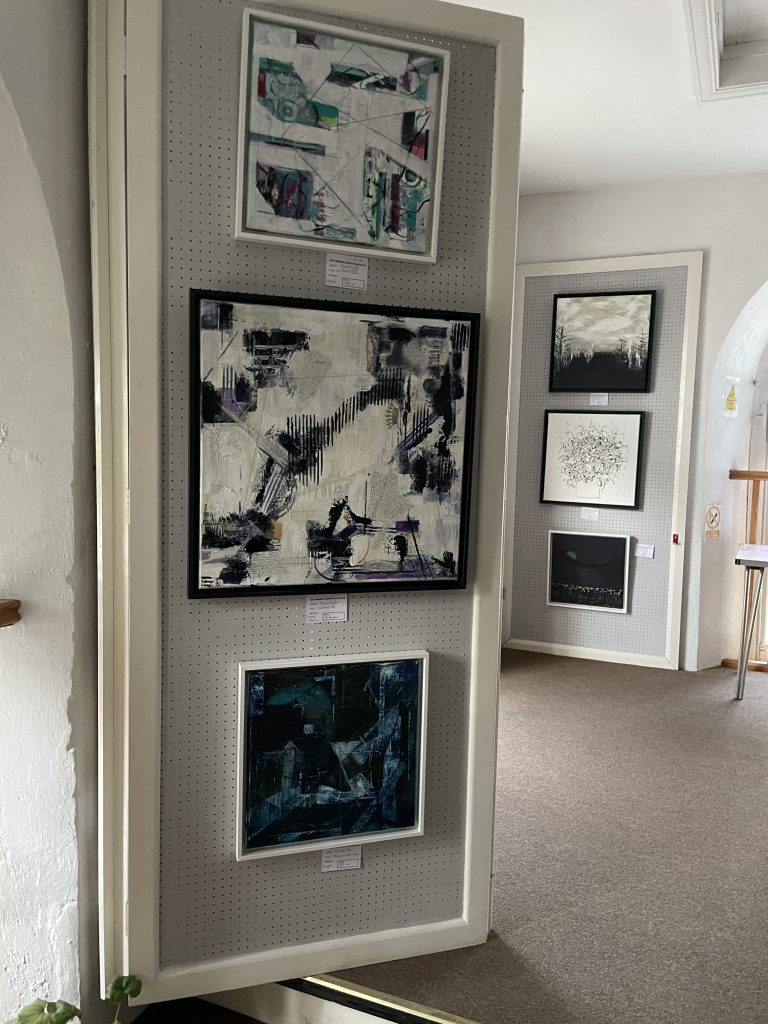 View of 6 abstract framed canvas acrylic paintings